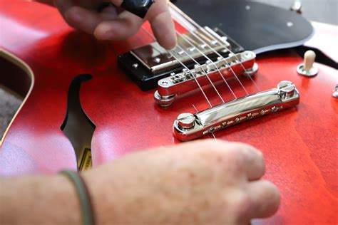 How Many Strings on an Electric Guitar and Why Do They Sometimes Feel Like They’re Judging You?